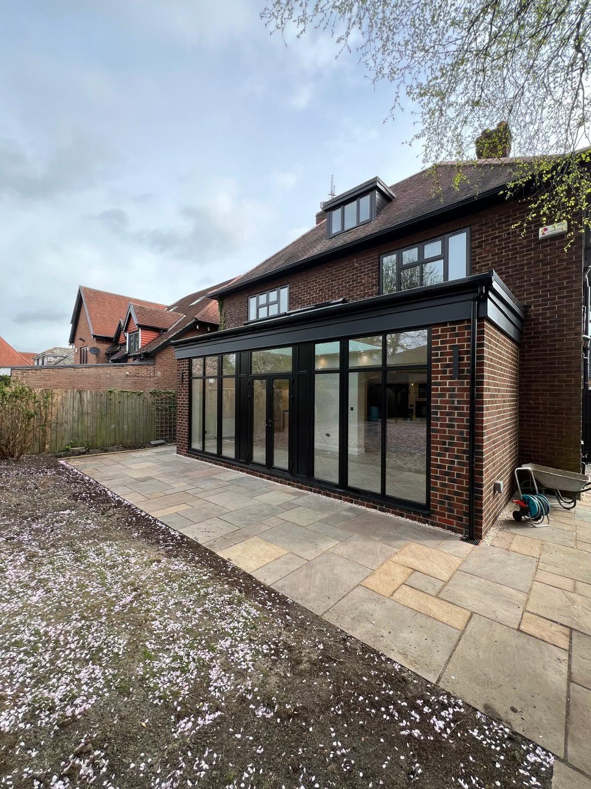 Side view of the Gosforth extension showing brickwork and glazed doors